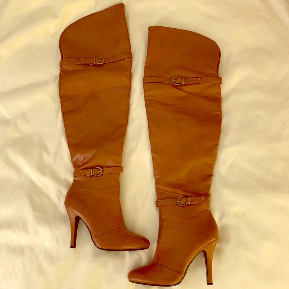 Tan/Cognac color over the knee high heeled boots.